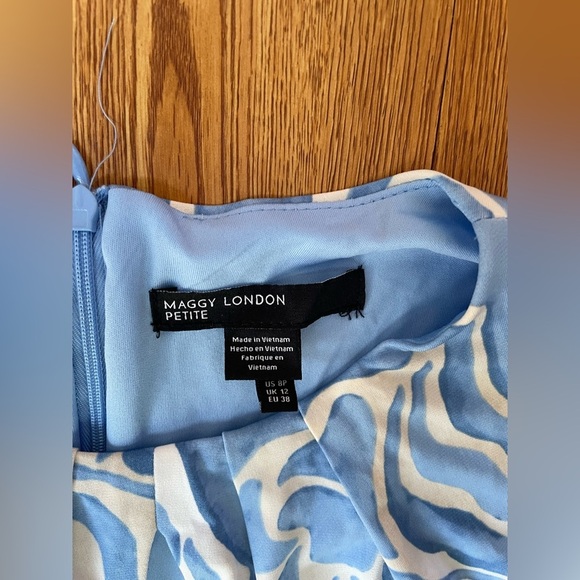 Maggy London summer blue print maxi dress
NWT
Size 8p - Picture 4 of 13